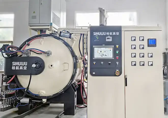 SIMUWU vacuum furnace with integrated control cabinet and front-loading furnace chamber.