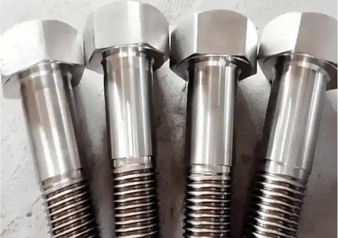 1.2379 steel hex bolts after vacuum oil quenching treatment, demonstrating improved dimensional stability and surface hardness