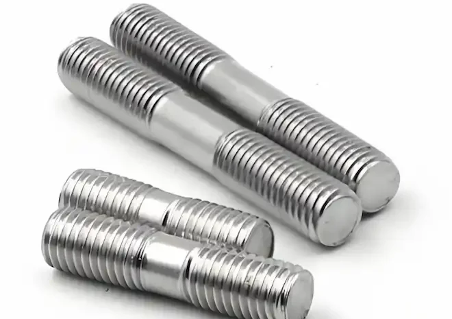 Cold-work tool steel stud bolts after vacuum oil quenching, showing wear-resistant fasteners used for high-load tooling applications