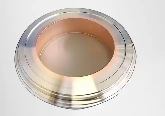 Components made of copper and stainless steel are joined together using a vacuum brazing process 