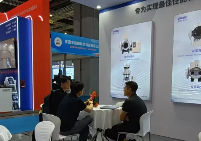 SIMUWU team engaging in professional exchanges about die steel quenching and equipment selection at DMC 2026